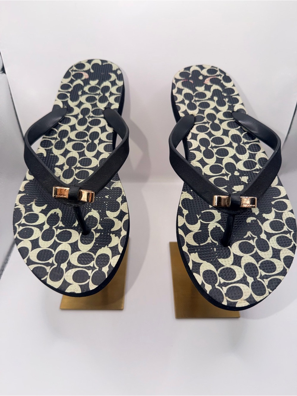 Coach Black Logo-Print Flip Flop Sandals with Gold Bow Accent